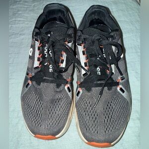 On Running Black and Orange Athletic Shoes